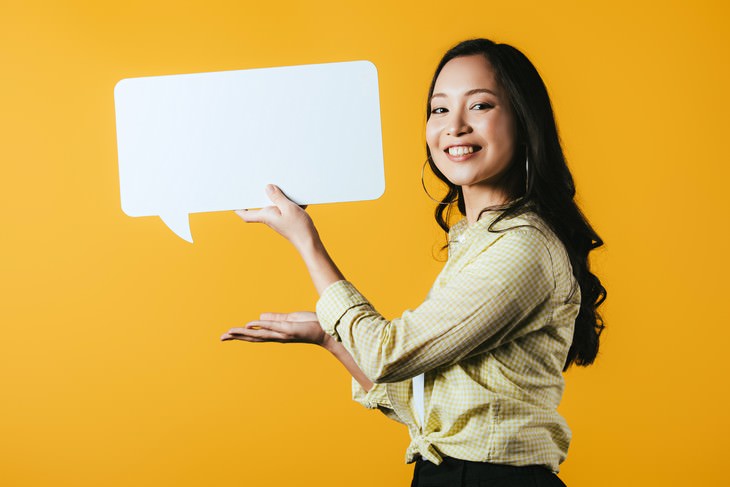 weird beneficial habits woman holding up a thought bubble