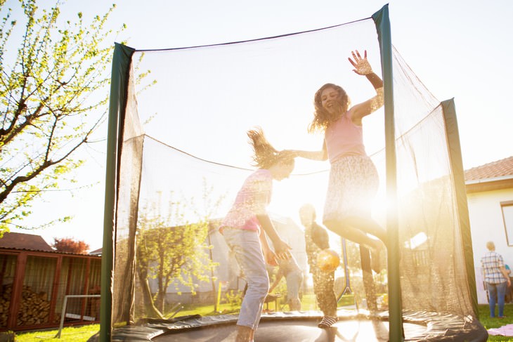 weird beneficial habits kids jumping on a trampoline