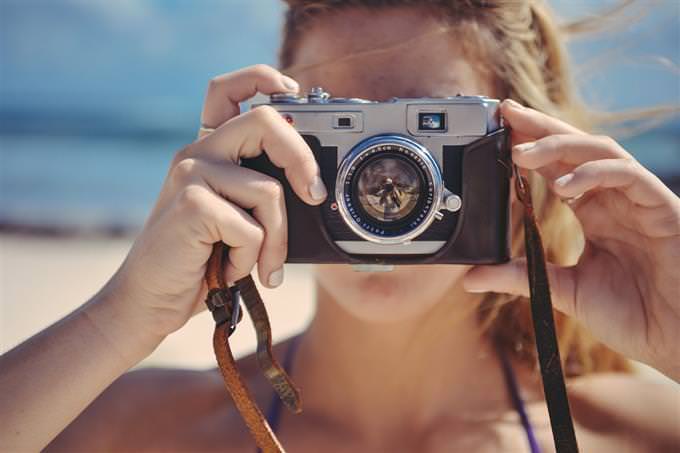 smile test: woman taking a photo