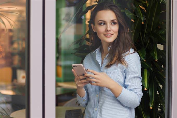 woman smiling distractedly