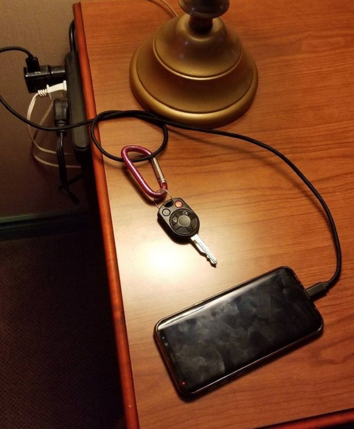 packing and hotel tricks car keys attached to phone charger