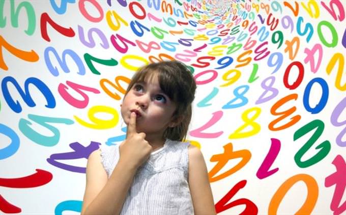 girl wondering about numbers