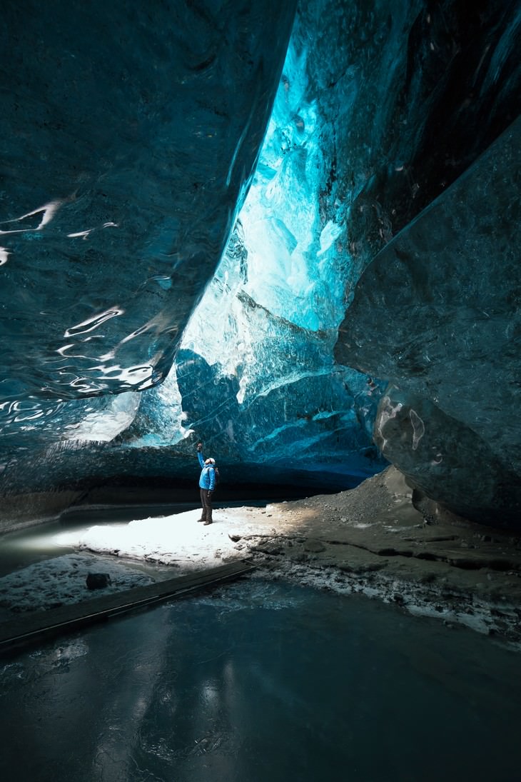 winter landscapes collection Person Standing in an Ice Cave in Iceland