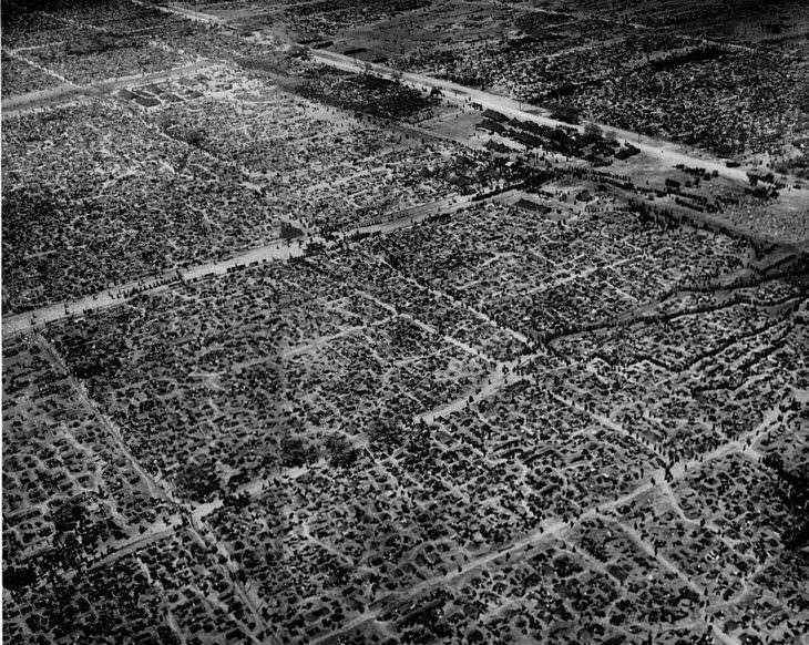 historical photos: Over 100,000 German prisoners of war in a temporary prison camp set up on the Western Front - May 1945.