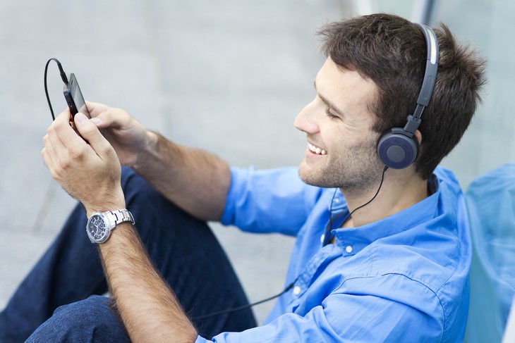 stress constipation man listening to music