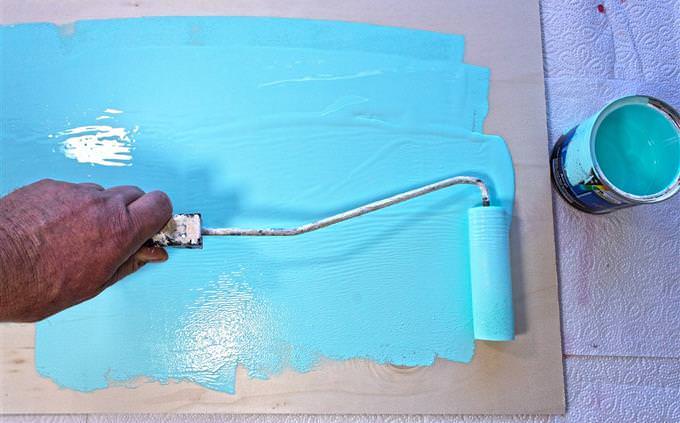 Test yourself: man paints in blue