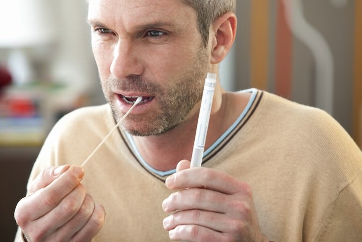 home DNA tests man taking a DNA test