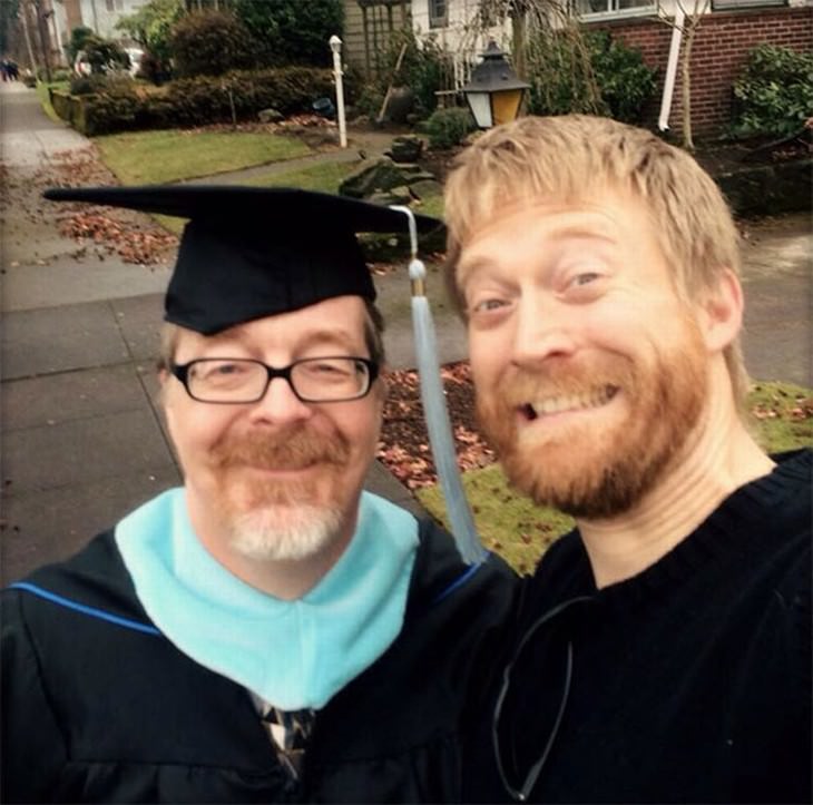 senior graduates son and dad graduated from college