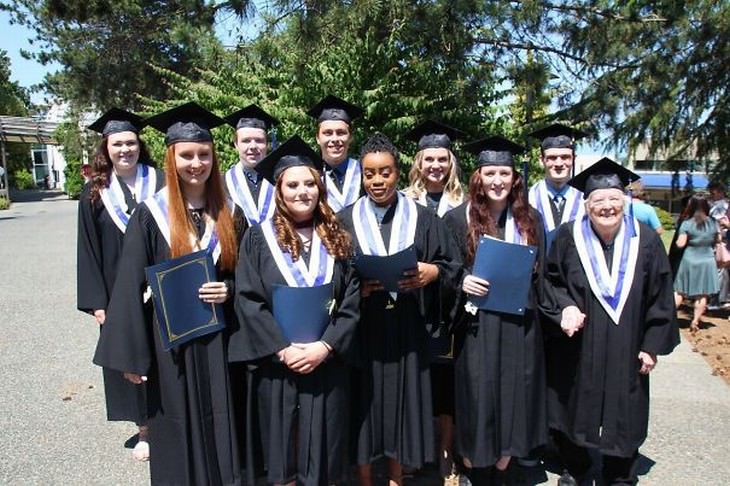 senior graduates high school class with a 92 year old