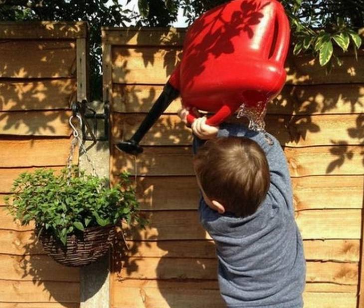 funny moments captured on camera boy watering flower fail