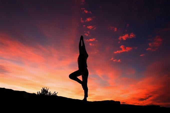 improve your life quiz yoga with a sunset in the background