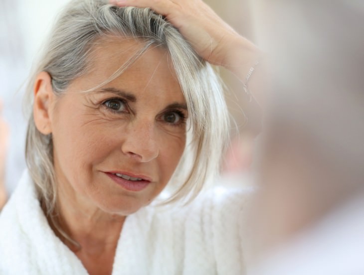wrinkle causes woman senior grey hair eye wrinkles