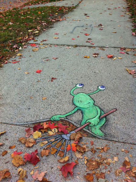 Plants and Street Art: snail alien creature sweeping leaves