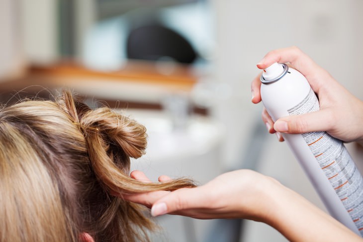 habits that cause hair loss hairspray