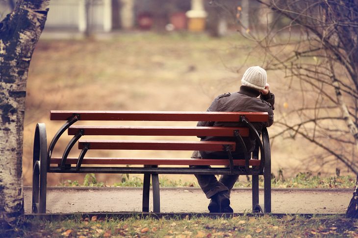 Lonely Millennials: alone on bench