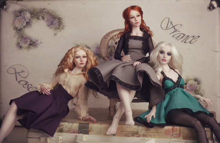 Porcelain dolls: three dolls classy