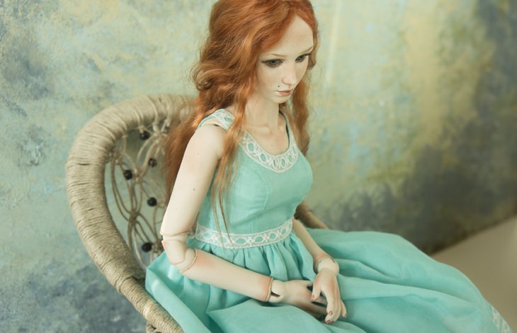 Porcelain dolls: redhead green dress