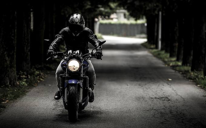 memory quiz: man on motorcycle