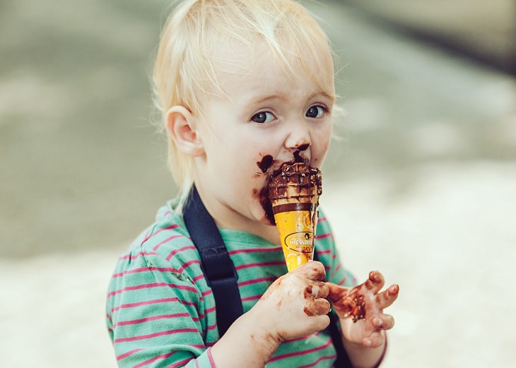 dark chocolate kid eating ice cream