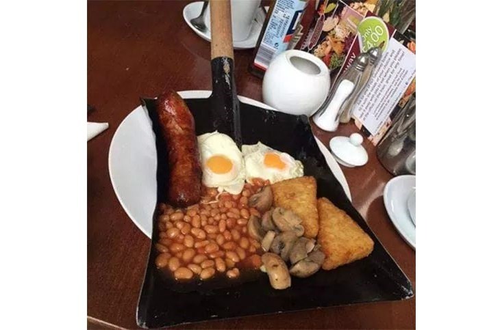 Pretentious food presentations: English breakfast on shovel
