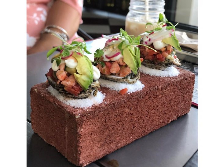 Pretentious food presentations: oysters on a brick