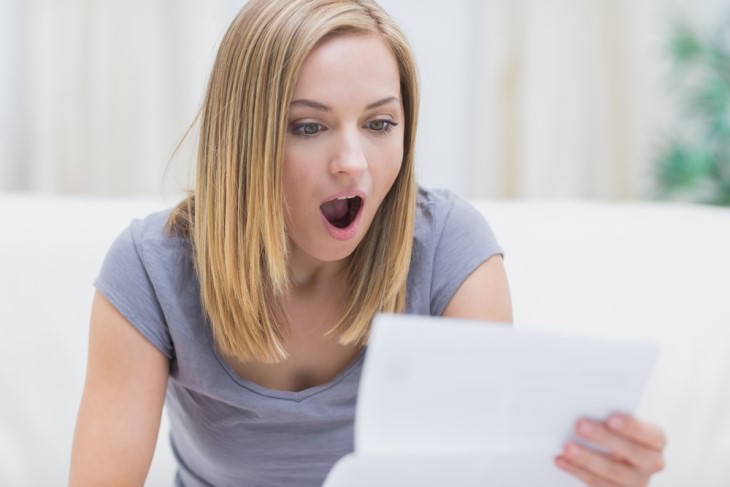 joke: woman reading letter in shock
