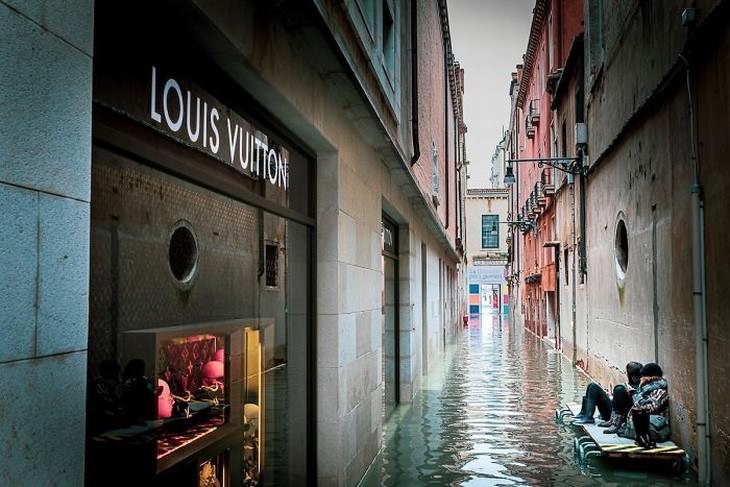 Flooded Venice street shop