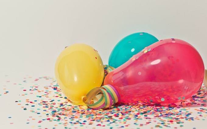 Balloons and confetti on the ground