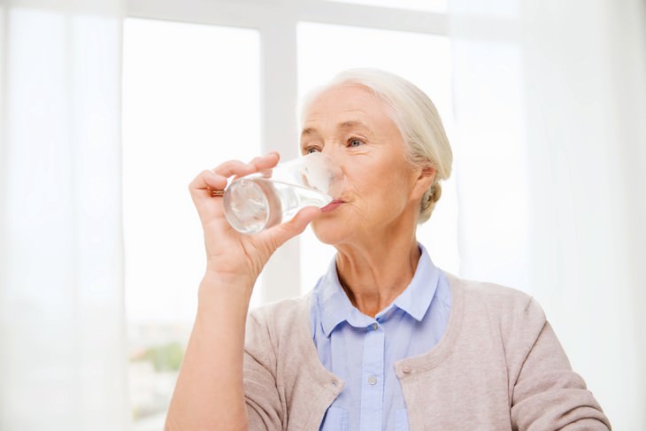 dehydration in seniors elderly woman drinking water