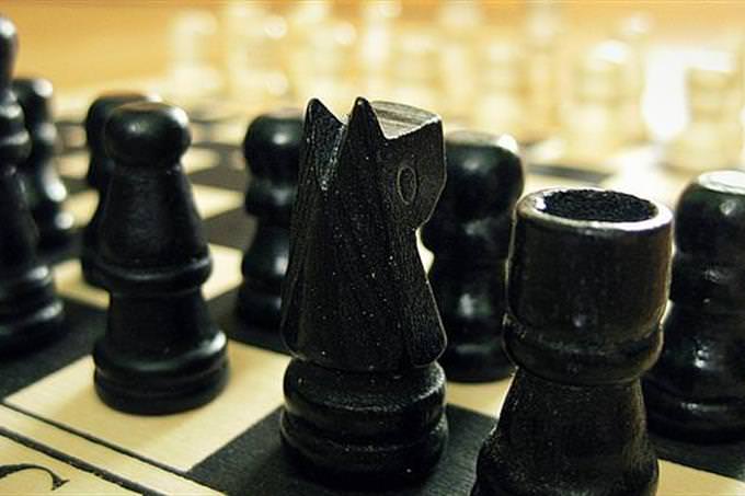 Black chess pieces in place