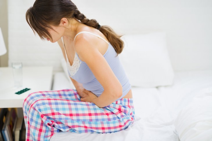 Important Health Benefits of Resistant Starch, woman with stomach ache