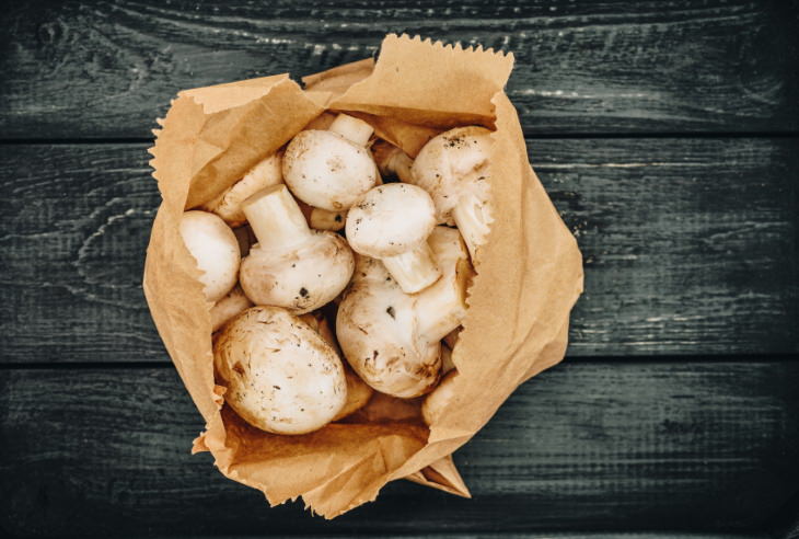 grocery tips mushrooms in a paper bag 