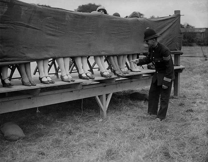 Past Beauty Practices That Seem Strange Today, A policeman judges an ankle competition at Hounslow, London 1930