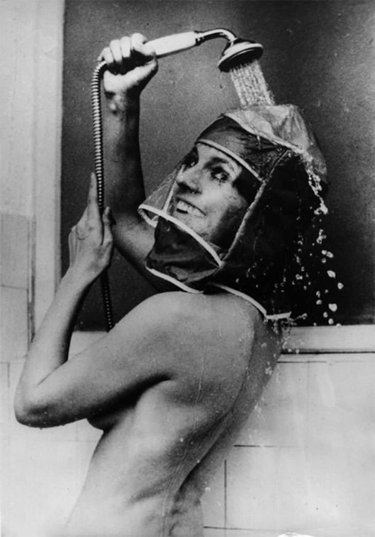 Past Beauty Practices That Seem Strange Today, shower head was used to protect the hair form getting wet, 1970