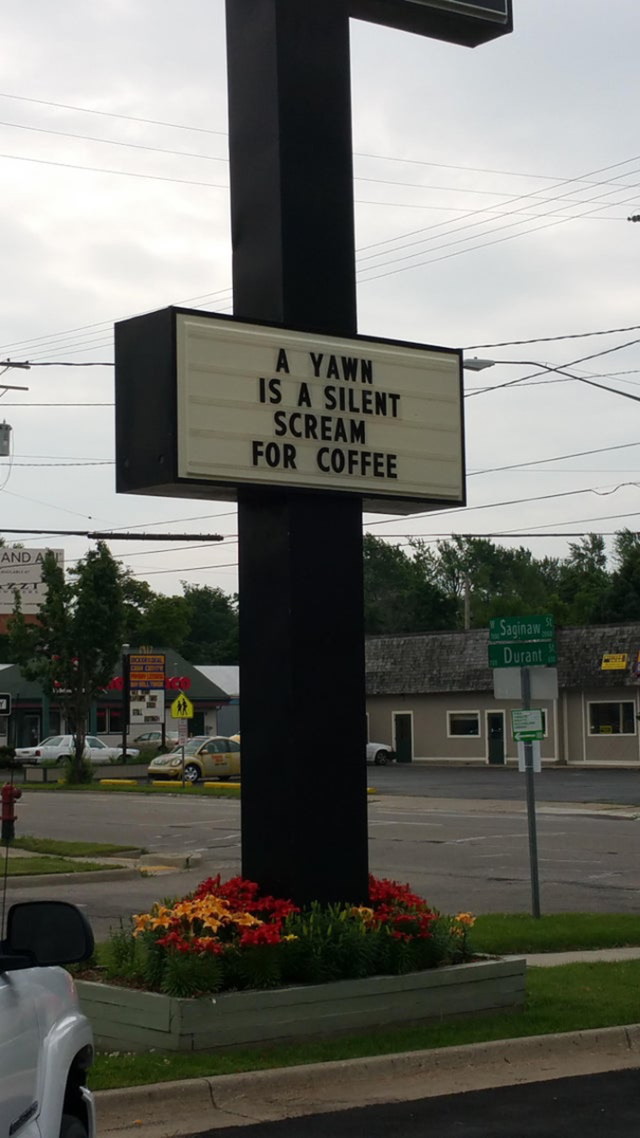 funny signs a yawn is a silent scream for coffee