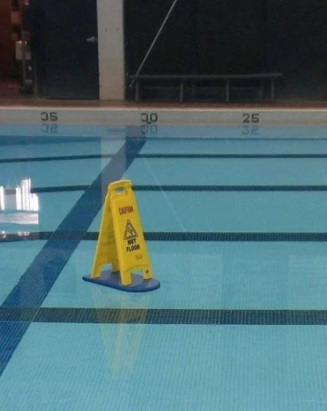 funny signs wet floor