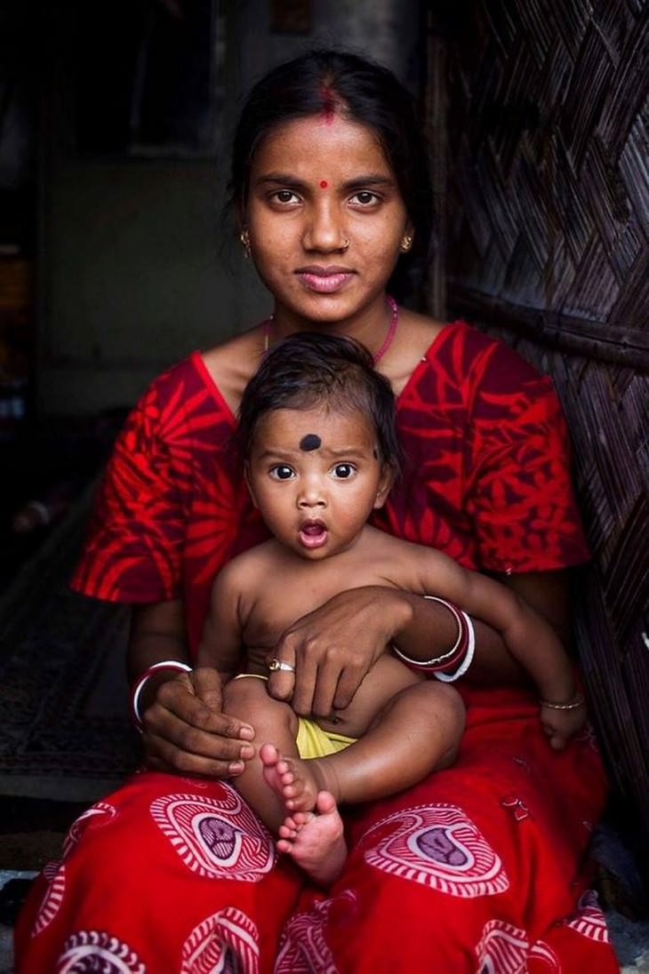 The Beauty of Motherhood in 18 Different Cultures Arpita and he son, Kolkata, India