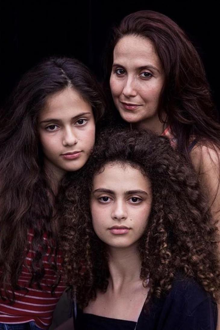 The Beauty of Motherhood in 18 Different Cultures Carmen and her daughters Ranya and Zara, Bucharest, Romania