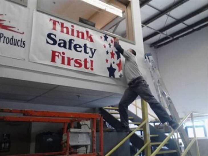 20 Heart Stopping Safety Fails, hanging a sign
