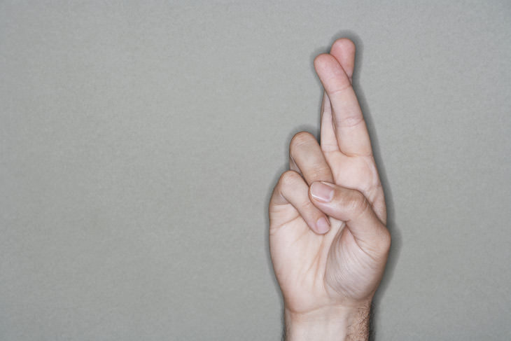 Origins of Most Popular Hand Gestures, crossed fingers