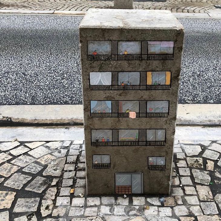 Street Artist CAL Uses Urban Corners Ingeniously, apartment building