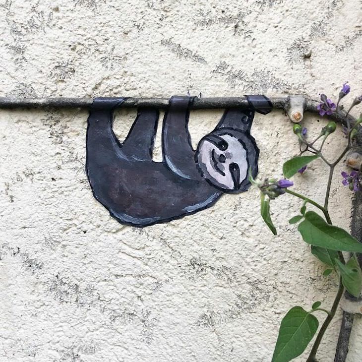 Street Artist CAL Uses Urban Corners Ingeniously, sloth