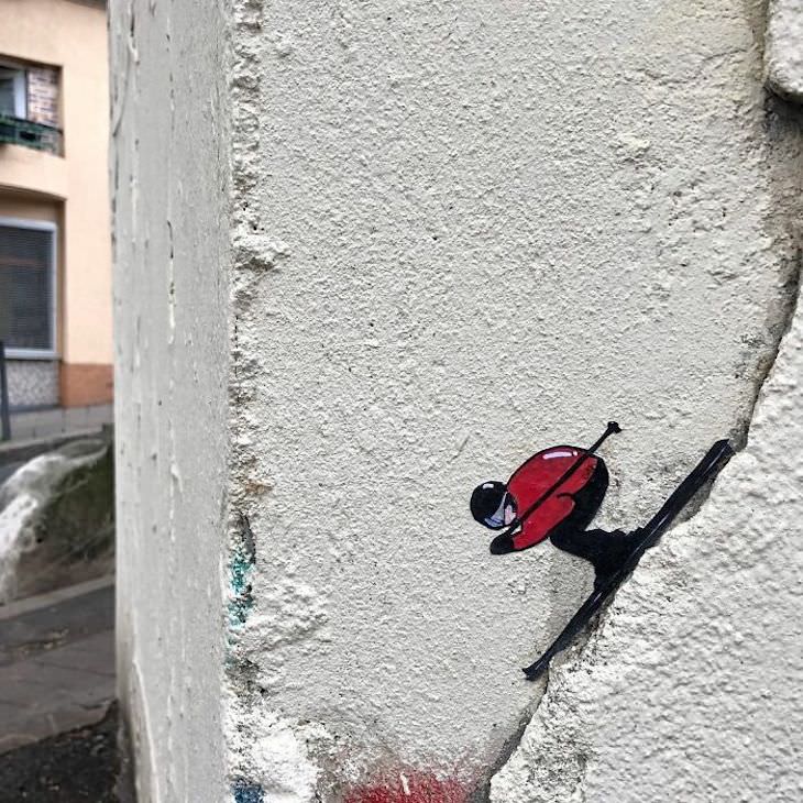 Artista de rua CAL usa esquinas urbanas engenhosamente