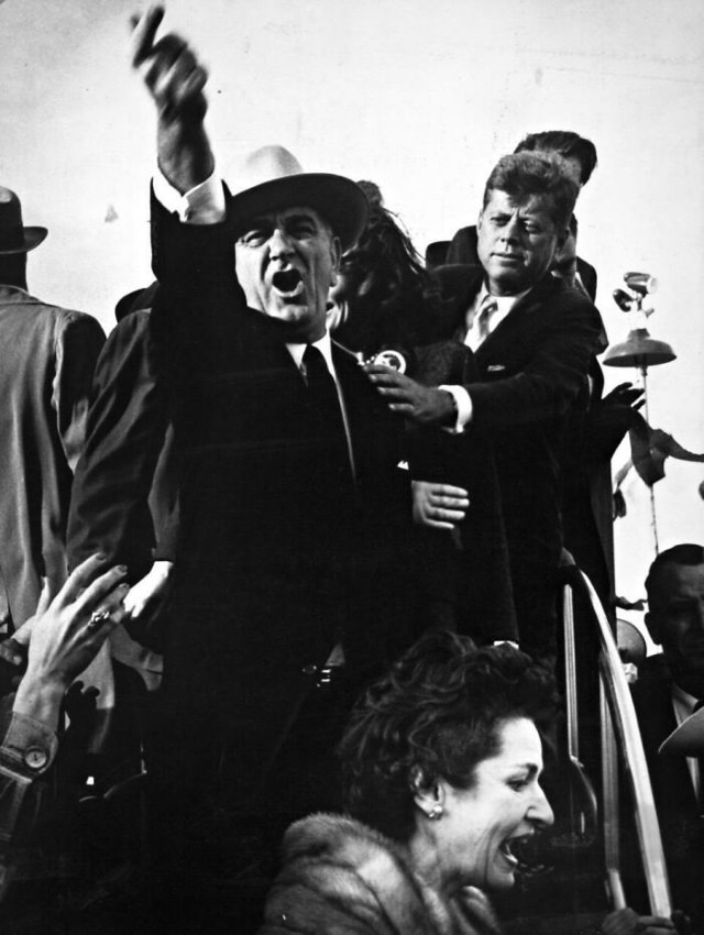 Historical Photos Lyndon B. Johnson yelling at the pilots of a nearby plane to cut their engines so that John F. Kennedy could speak as Kennedy is seen trying to calm him down. Taken during the 1960 presidential campaign in Amarillo, Texas.