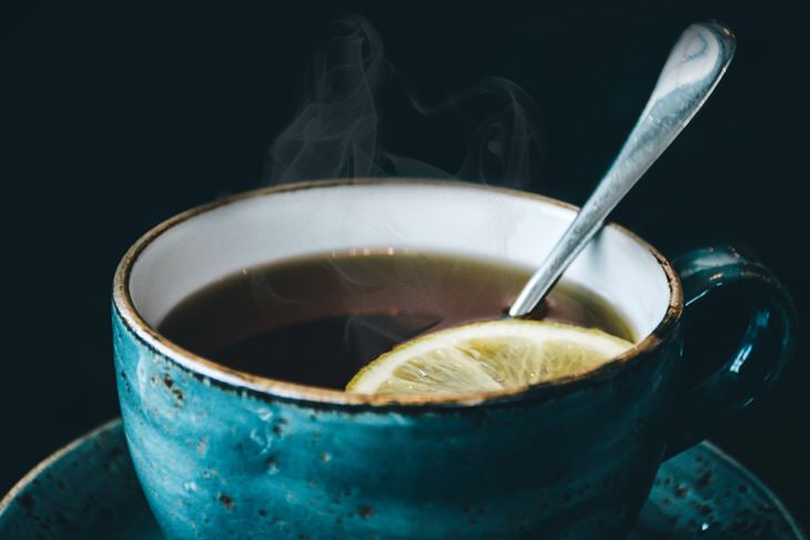 What to Eat & Avoid When You’re Sick cup of tea with lemon