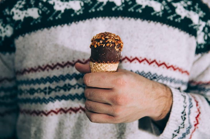 Dark Chocolate and Heart Health man holding chocolate ice cream