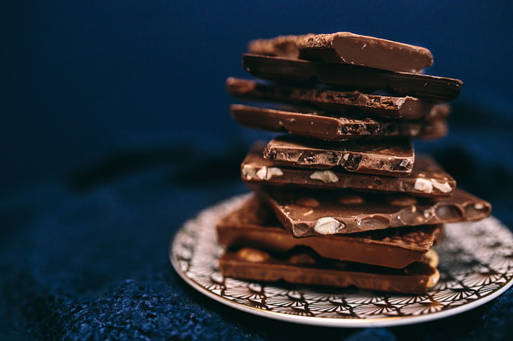 Dark Chocolate and Heart Health Dark Chocolate stacked on a plate