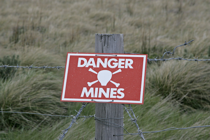 6 Low-Tech Solutions That Fixed High Tech Problems, warning sign of landmines
