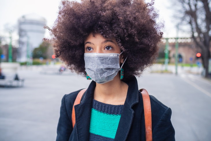 When to Replace Cloth Masks woman wearing face mask