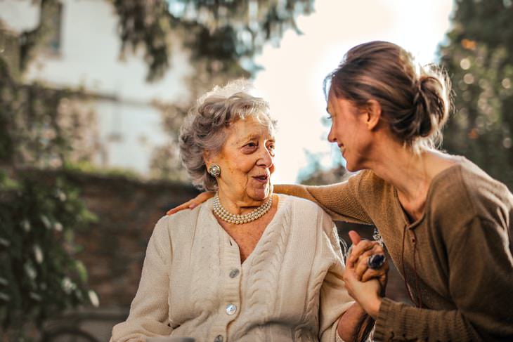 Hypertension Myths older and younger woman holding hands